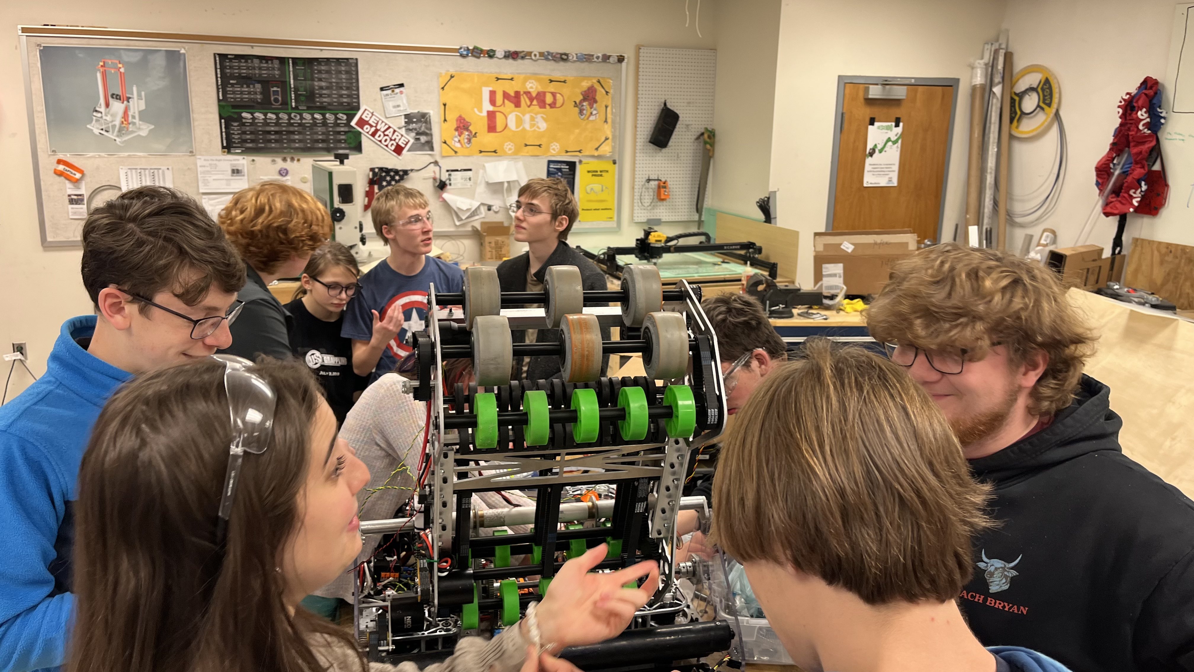 Robot surrounded by team
